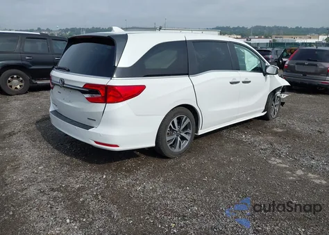 2023 Honda Odyssey Touring z USA, uszkodzony, nr VIN 5FNRL6H80PB004704